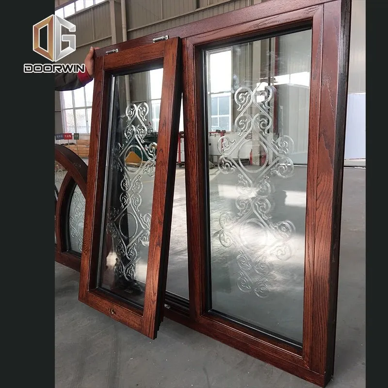 Wooden windows grills design round window